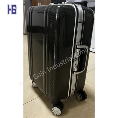 Nrov ntawm Carbon Fiber Luggage Case thiab Yuav Ua Li Cas Lawv Ua