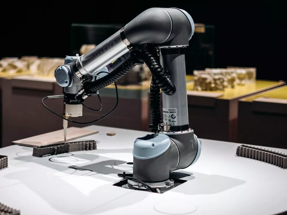 Carbon Fiber hlau Robotic Caj npab: Hnav lub zog hauv Automation